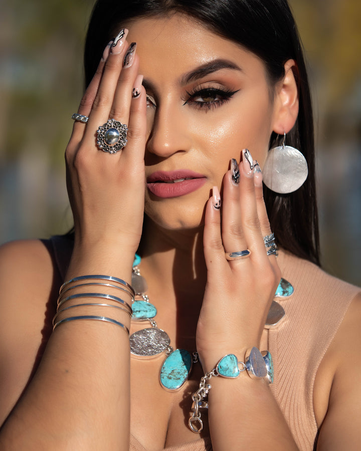 Matted Silver Disk Earrings on Model