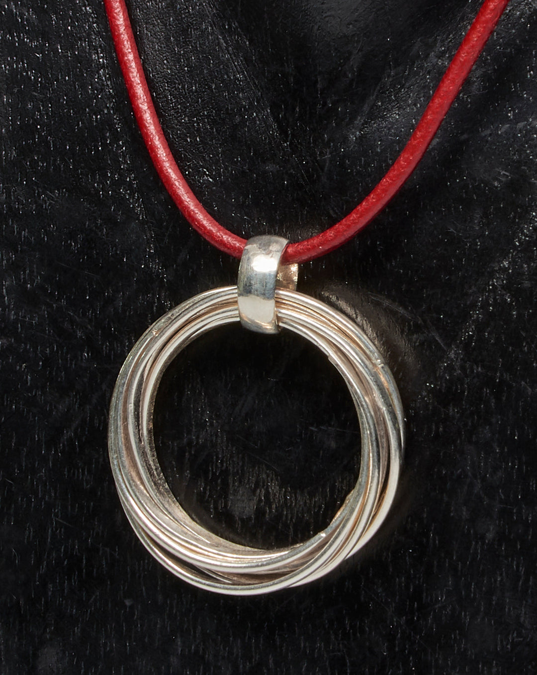 7 Interlinked Silver Loop Pendant