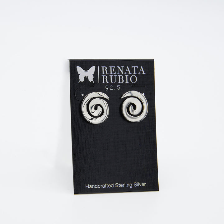 Coiled sterling silver post earrings by Renata Rubio 92.5 – handcrafted, high-polish silver with lifetime warranty.