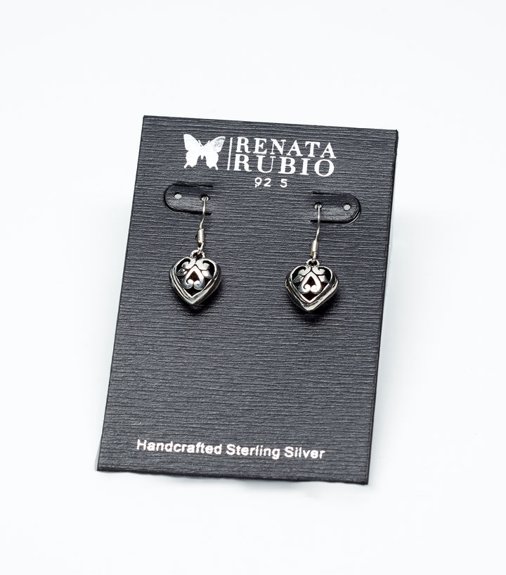 Sterling silver heart dangle earrings by Renata Rubio 92.5