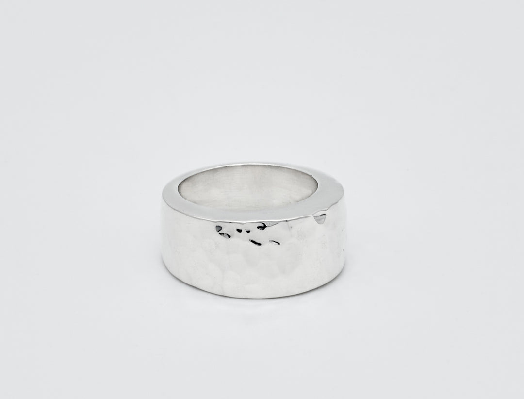 Tapered dome sterling silver ring with a pounded finish by Renata Rubio 92.5