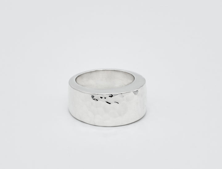 Tapered dome sterling silver ring with a pounded finish by Renata Rubio 92.5