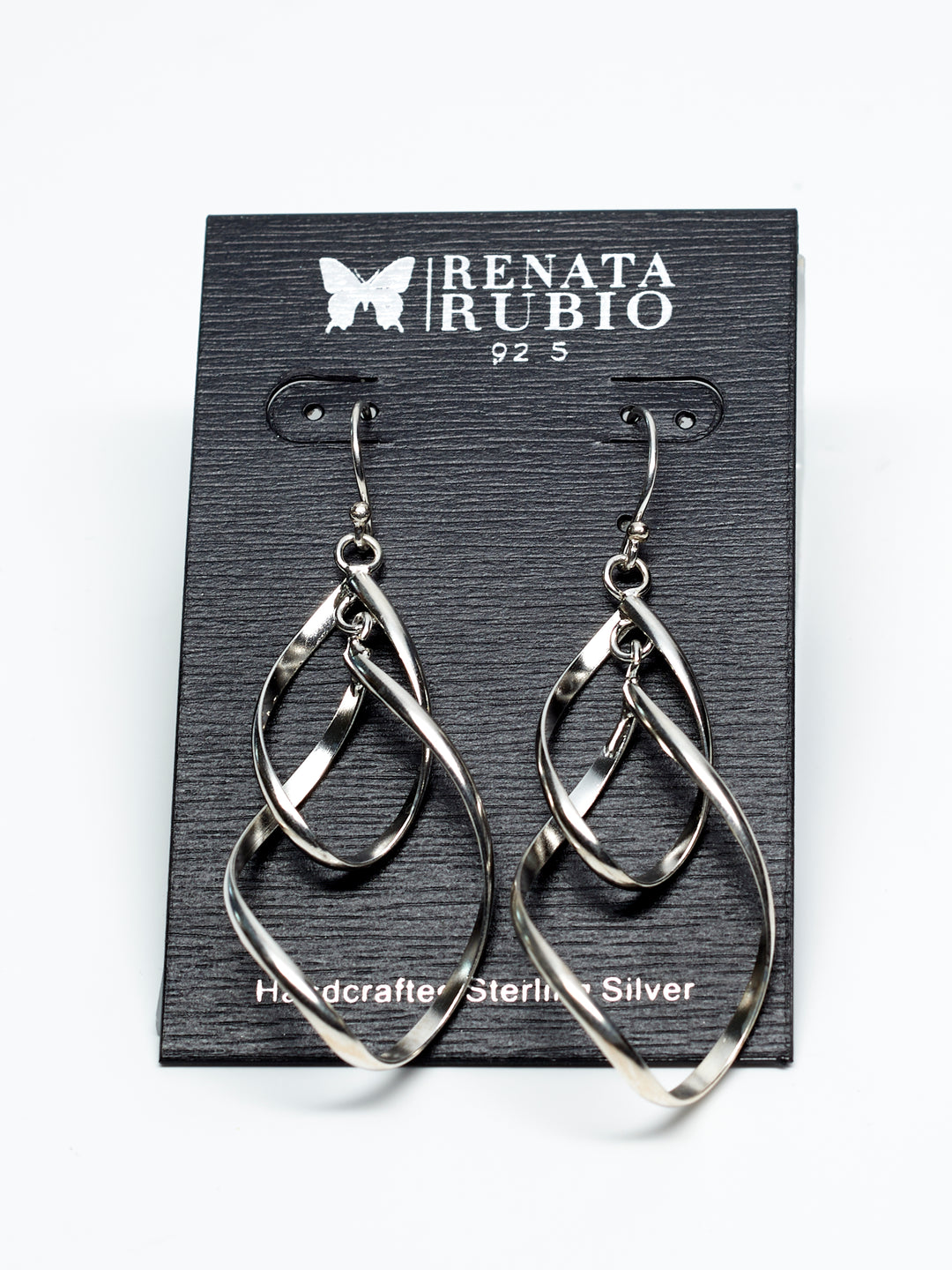 Interlinked twisted sterling silver teardrop earrings with a high-polish finish by Renata Rubio 92.5