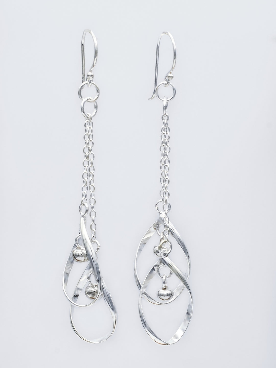 Twin teardrop sterling silver dangle earrings with delicate silver beads by Renata Rubio 92.5