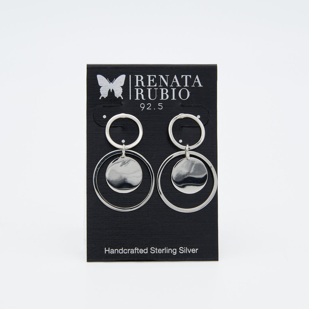Double Circle Disc Sterling Silver Earrings by Renata Rubio, 1.5 inches long with polished disc inside two open circles
