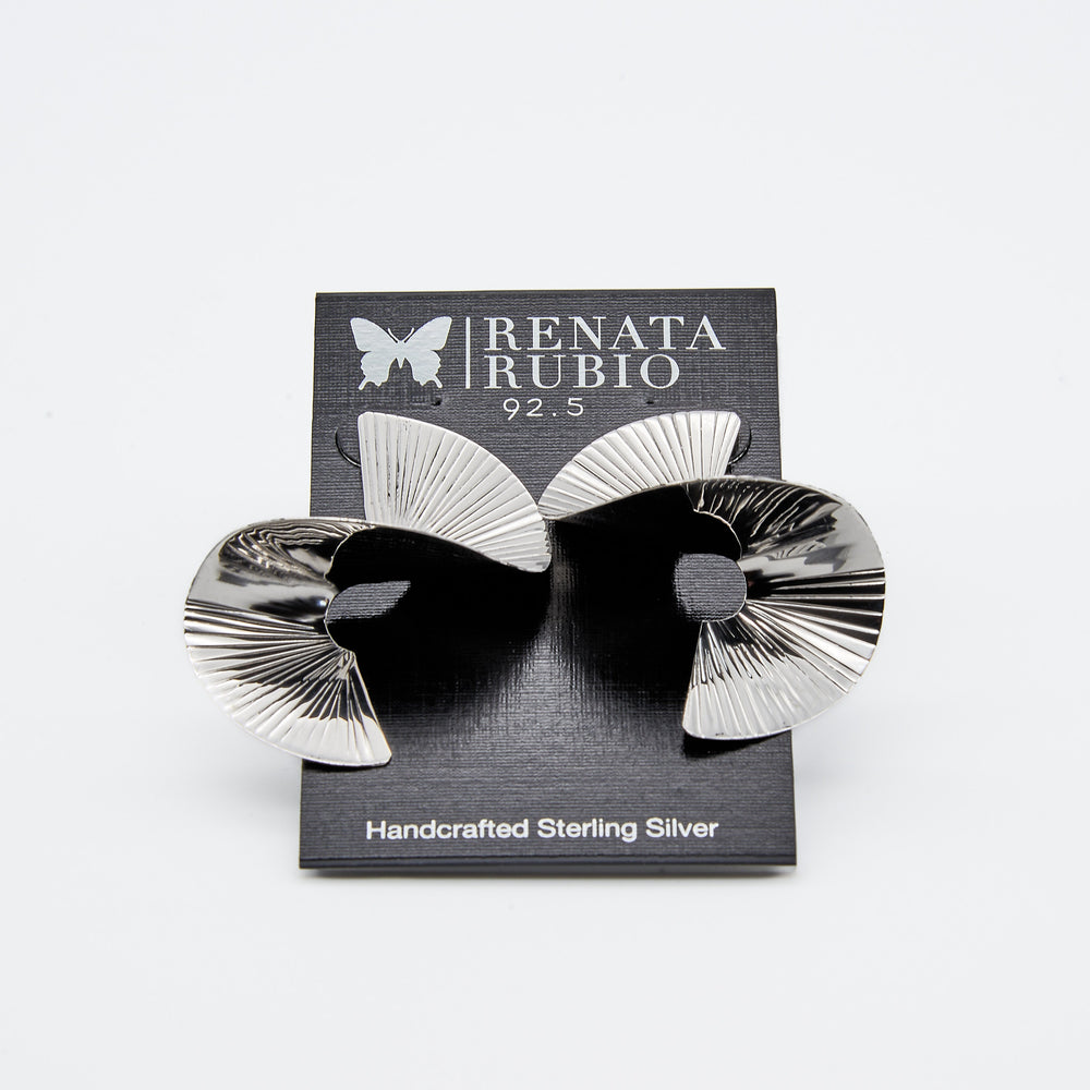 Renata Rubio 92.5 folded fan sterling silver earrings with sculptural curved shape and lined texture.