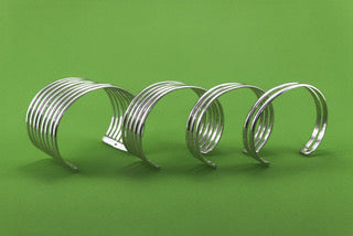 Two Straight Band Silver O'Keeffe Cuff and other cuffs