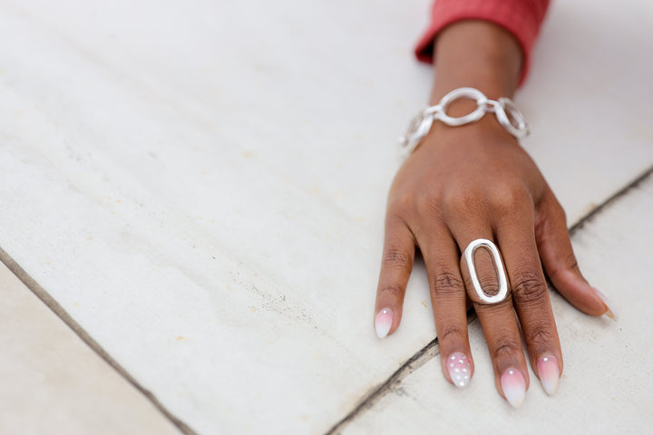 Graduated Interlinked Circle Silver Bracelet on Model