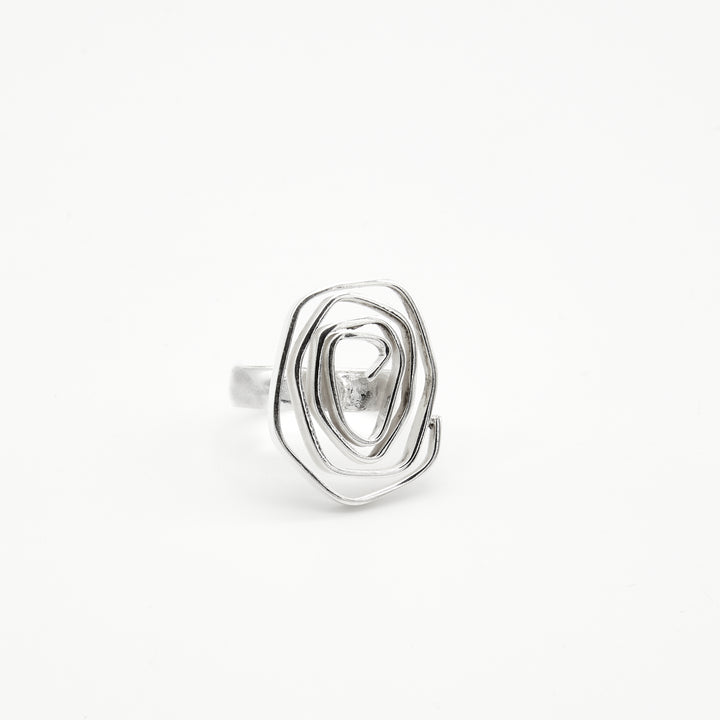 Labyrinth sterling silver ring by Renata Rubio 92.5 – handcrafted, intricate coiled wire design with a polished finish.