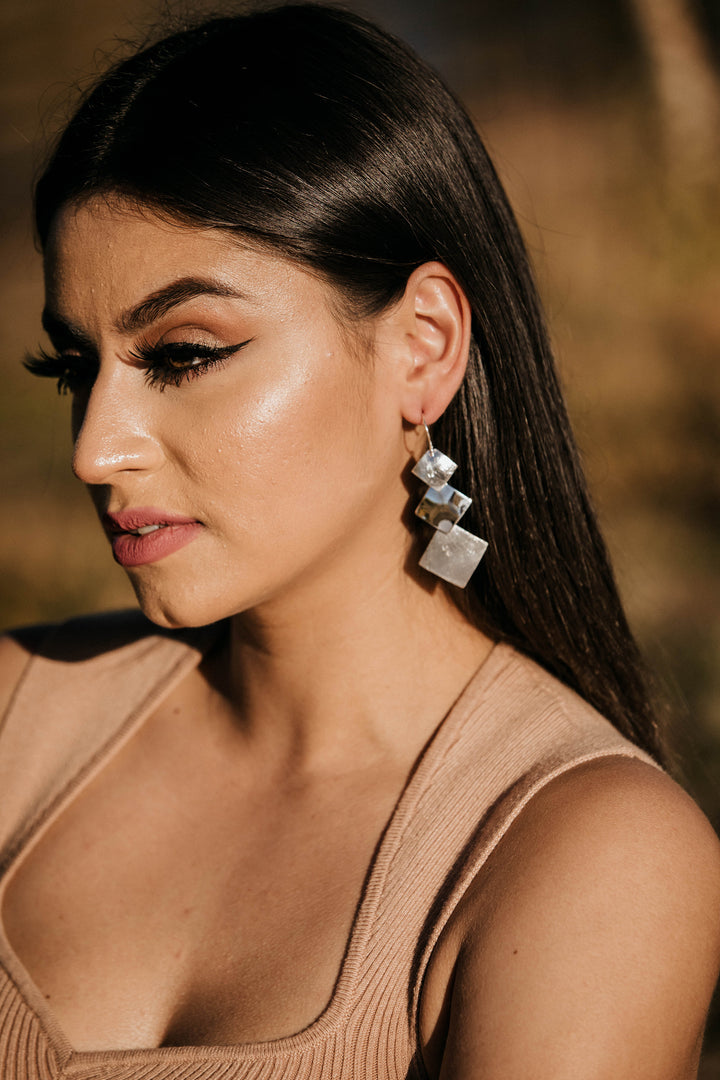 Matted and Shiny Silver Earrings on Model