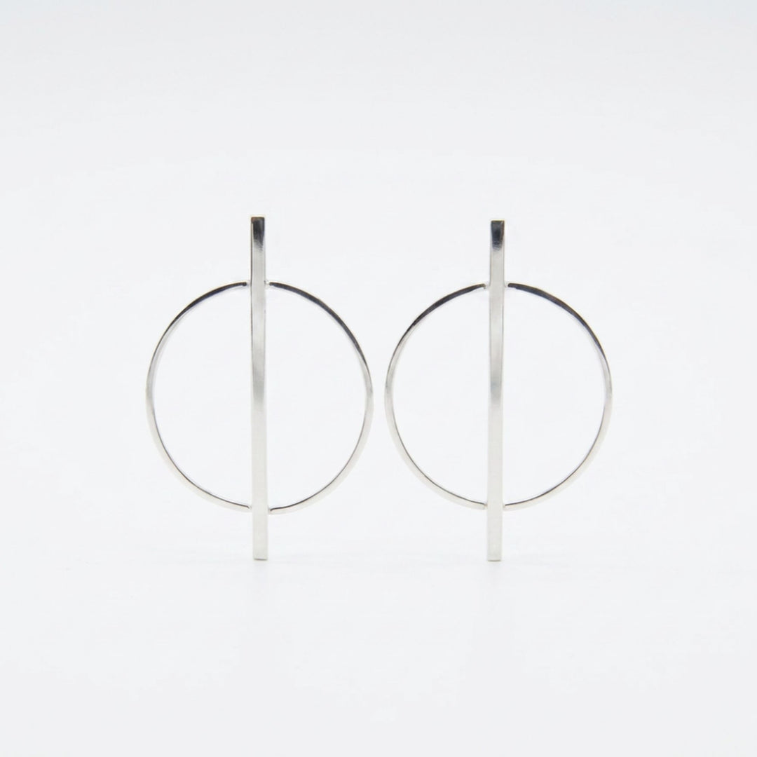 Renata Rubio 92.5 Modern Line & Circle Sterling Silver Earrings — minimalist bar intersecting circle, handcrafted in Taxco, Mexico.
