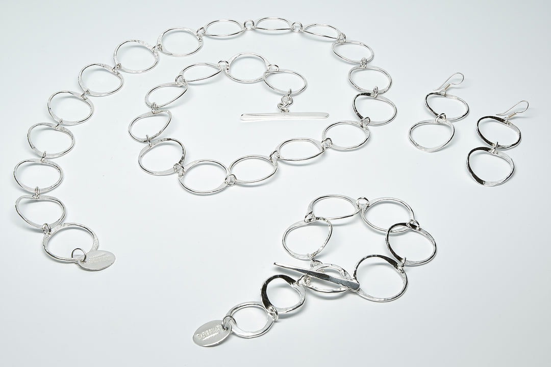 Open Twin Pounded Silver Circle Earrings - Renata Rubio 92.5 - EGG860