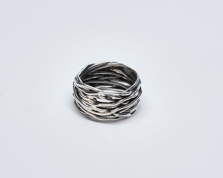 Handmade oxidized silver nest band with a sculptural design by Renata Rubio 92.5