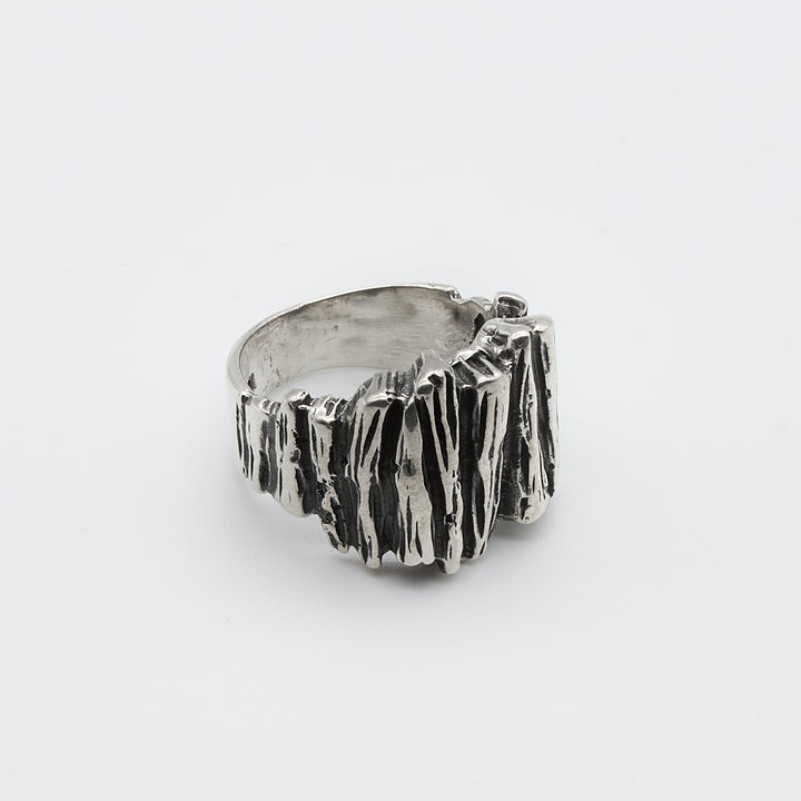 Sterling silver wood grain ring with oxidized finish, handmade using lost-wax casting. Unique artisan jewelry by Renata Rubio 92.5