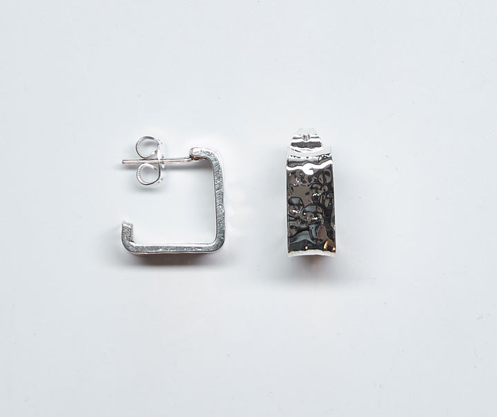 Small square sterling silver hoop earrings with a pounded finish by Renata Rubio 92.5 - Handmade sterling silver jewelry with a lifetime warranty.