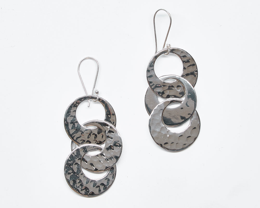 Pounded silver trio dangle earrings by Renata Rubio 92.5 – handcrafted, interlinked, and elegantly polished artisan jewelry.