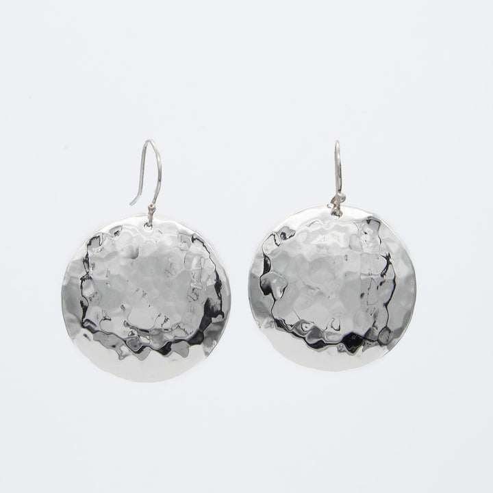 Sterling silver hammered disk earrings with domed surface, 1.3 inch diameter, by Renata Rubio 92.5