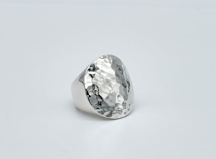 Solid convex silver ring by Renata Rubio 92.5 – handcrafted, pounded texture, and bold artisan sterling silver jewelry.