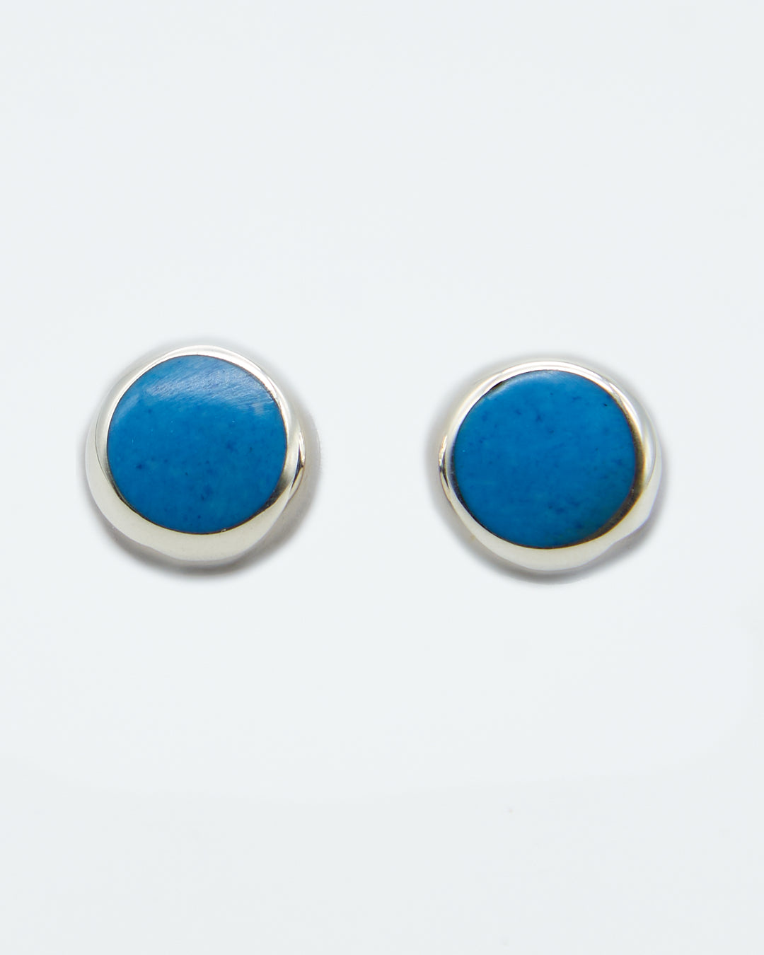 Round sterling silver stud earrings with colorful denim lapis enamel by Renata Rubio 92.5