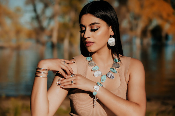 Matted Silver Disk Earrings on Model