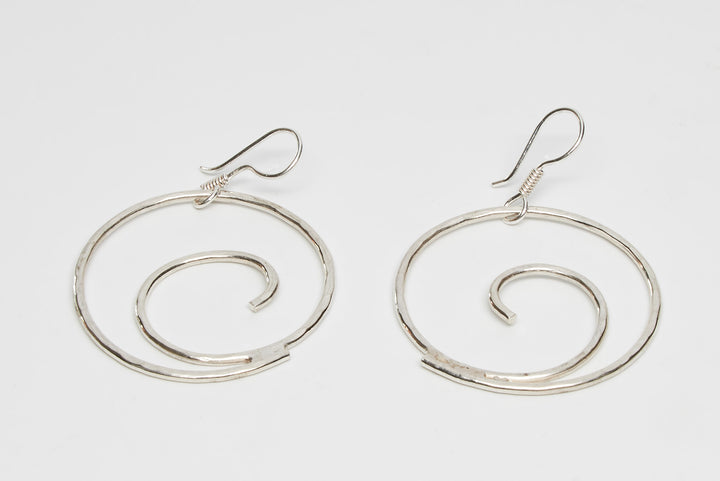 Silver Curled Loop Earrings by Renata Rubio 92.5 - Handmade sterling silver jewelry with lifetime warranty.