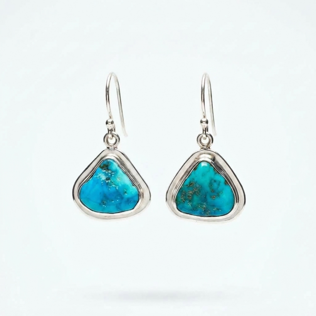 Sleeping Beauty Turquoise dangle earrings in sterling silver by Renata Rubio 92.5, artisan made and elegant