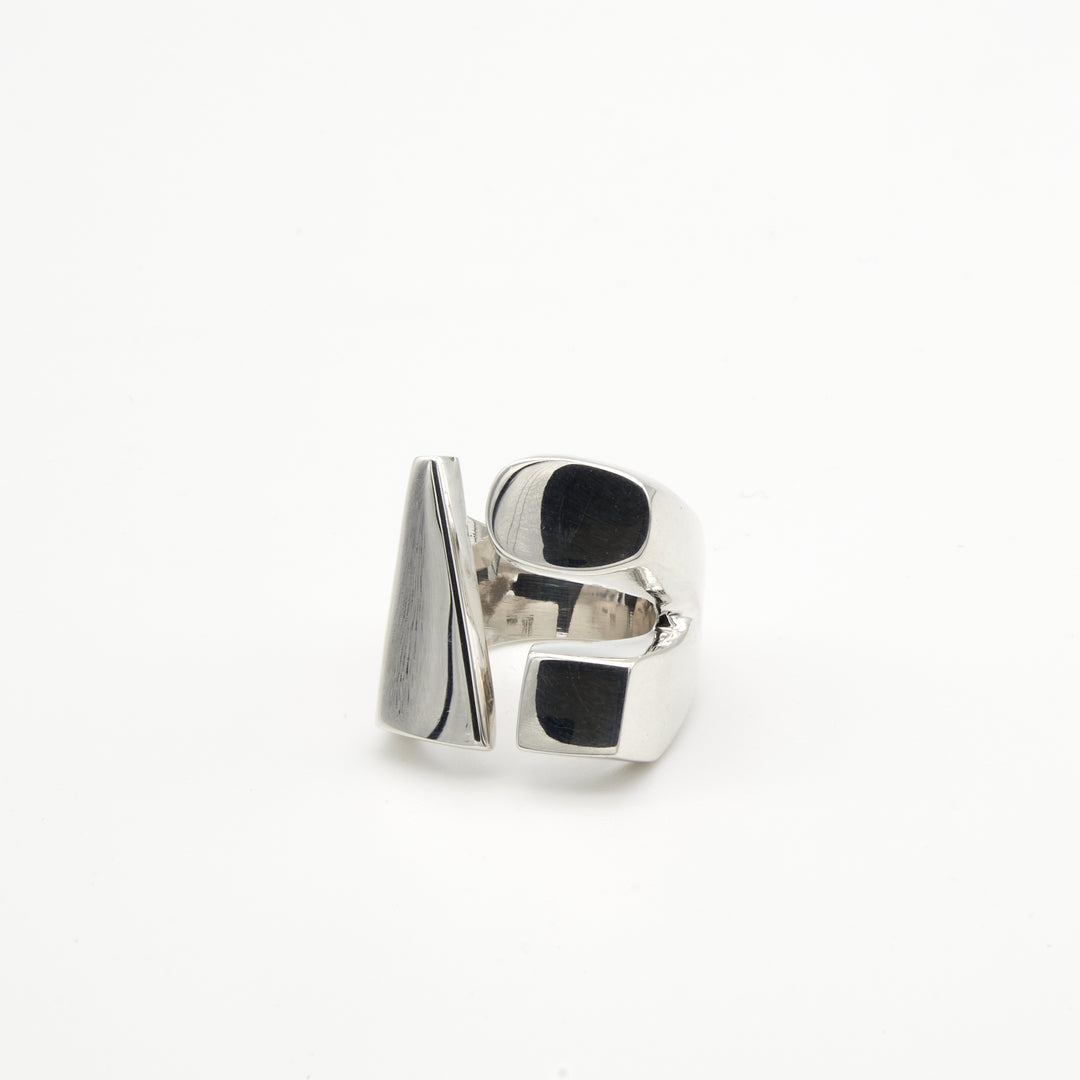 Sterling silver ring featuring triangle, oval, and square shapes with a high-shine finish. Artisan-crafted by Renata Rubio 92.5