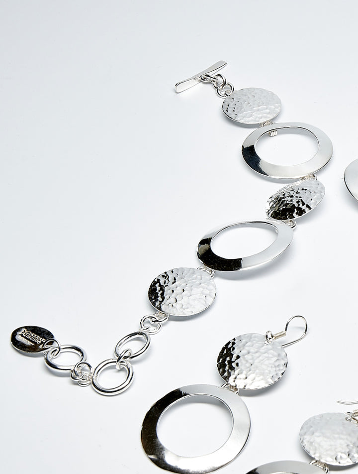 Solid and Open Silver Disk Bracelet - Renata Rubio 92.5 - handmade sterling silver jewelry with lifetime warranty.