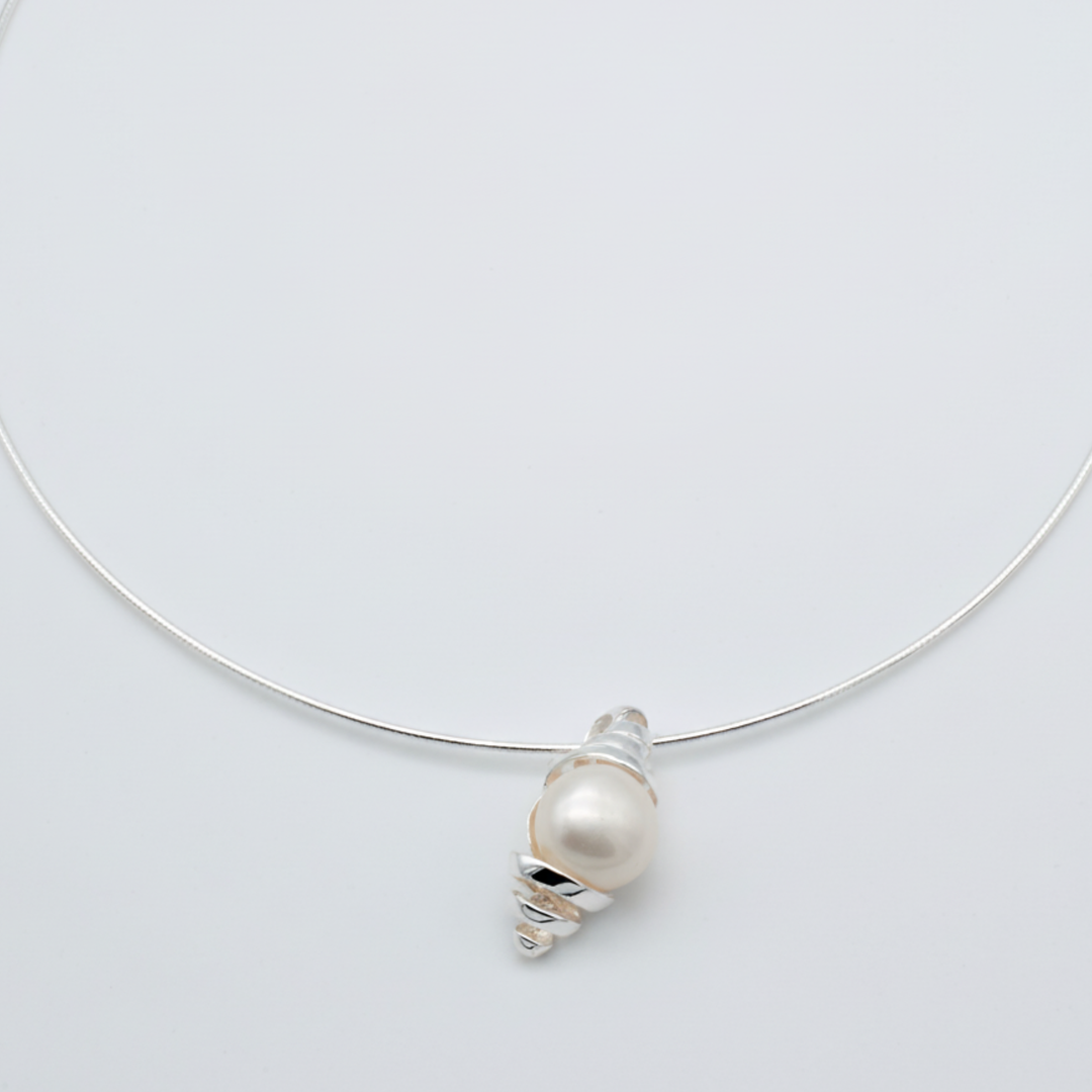 Renata Rubio handcrafted sterling silver pearl pendant, double wrap silver design with vertical coiling form. Genuine round cultured pearl.