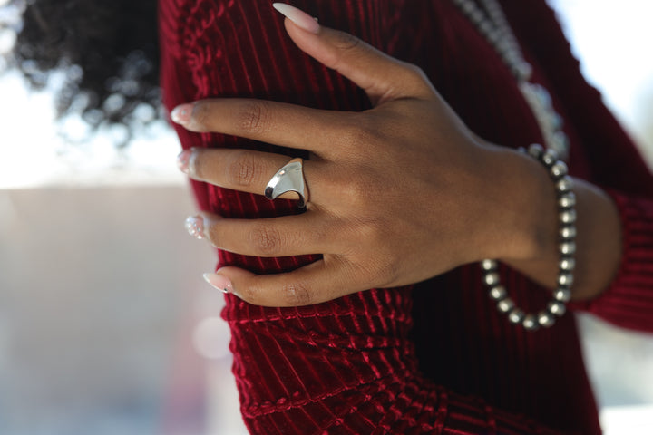 Sterling silver tall wave ring with a high-polish finish by Renata Rubio 92.5