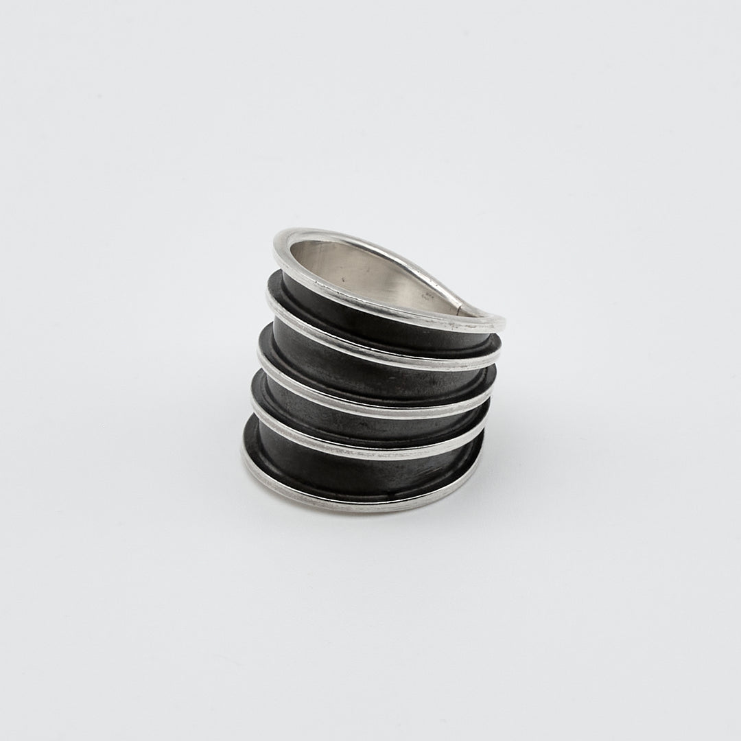 Tapered oxidized silver ring by Renata Rubio 92.5 – handcrafted, polished raised lines with an oxidized contrast.