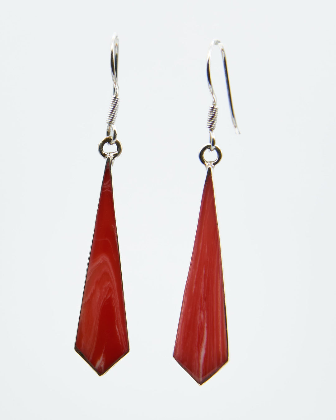 Sterling silver tie-shaped dangle earrings with Pink Coral enamel faux stones. Artisan-crafted by Renata Rubio 92.5