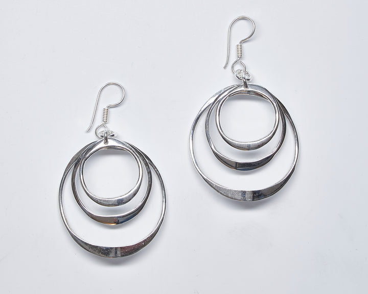 Triple Curved Silver Circle Earrings by Renata Rubio 92.5 - Playful Elegance and handmade craftsmanship.