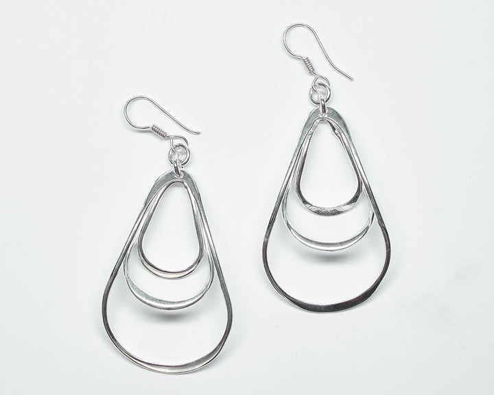 Modern triple pear sterling silver earrings with a sleek design by Renata Rubio 92.5 -Handmade sterling silver jewelry with a lifetime warranty.