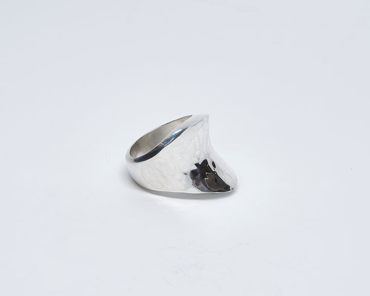 Pounded silver saddle ring by Renata Rubio 92.5 – handcrafted, high-polish, and uniquely sculptural sterling silver jewelry.