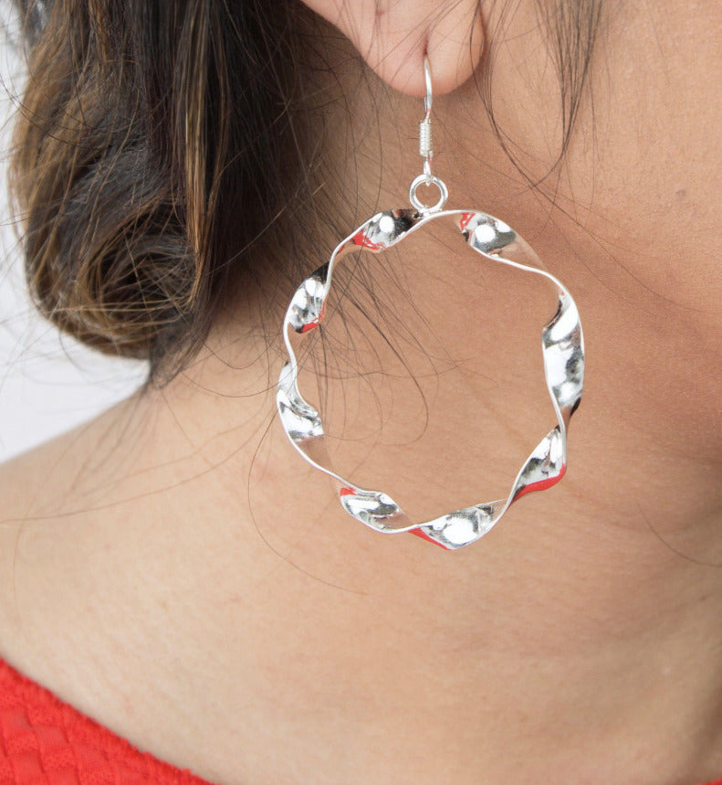 Round Twisted Silver Dangle Earrings on Model