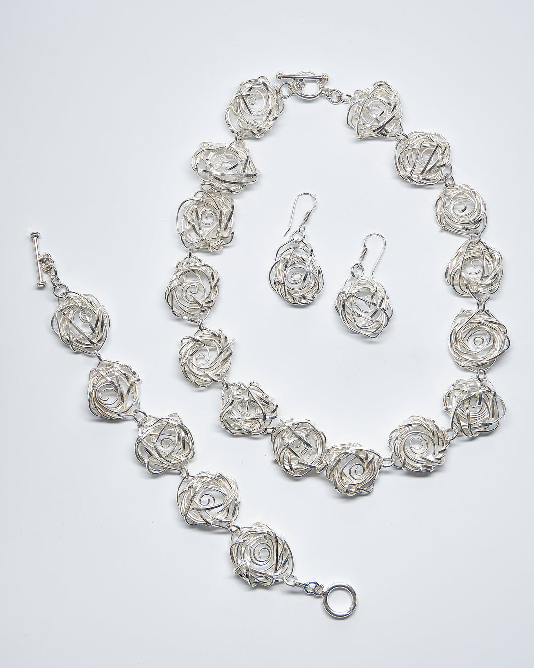 Twisted Silver Rose Set of Necklace, Dangle Earrings and Bracelet - Renata Rubio 92.5