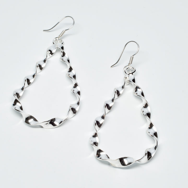 Twisted sterling silver teardrop dangle earrings with a classic, handcrafted design by Renata Rubio 92.5