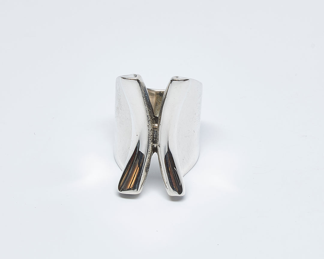 Wide folded silver ring by Renata Rubio 92.5 – handcrafted, high-polish, and sculptural sterling silver jewelry.