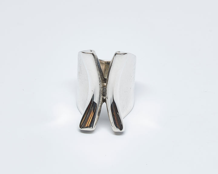 Wide folded silver ring by Renata Rubio 92.5 – handcrafted, high-polish, and sculptural sterling silver jewelry.