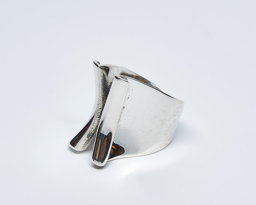 Wide folded silver ring by Renata Rubio 92.5 – handcrafted, high-polish, and sculptural sterling silver jewelry.