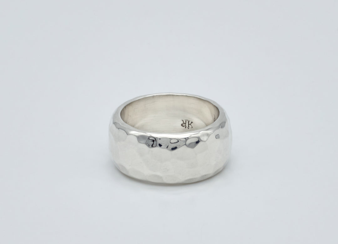 Wide hammered sterling silver band with a textured finish by Renata Rubio 92.5