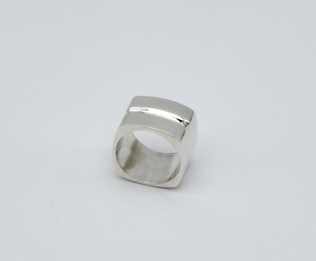 Wide square sterling silver ring with a modern geometric design by Renata Rubio 92.5