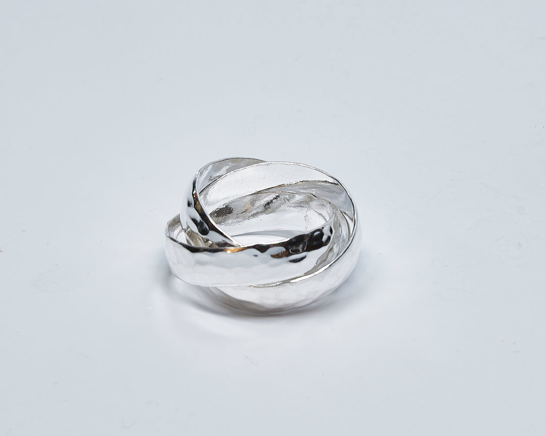 Wide interlinked three-band sterling silver ring with sleek or pounded finish by Renata Rubio 92.5